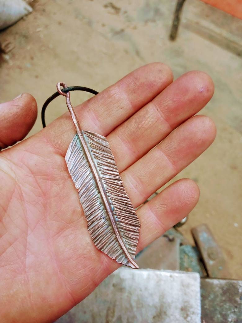 Copper feather pendant necklace
